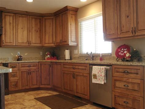 Predominantly red undertones are common on cherry wood, yet it can range from deep brown to pale yellow. Rustic cherry kitchen photos