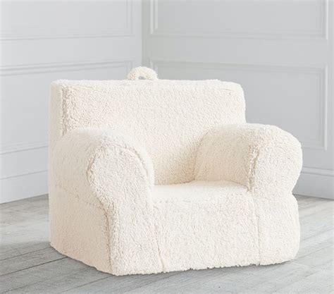 I set up a portable dvd player and he watches his shows while sitting in the chair. Oversized Cream Sherpa Anywhere Chair® | Pottery Barn Kids