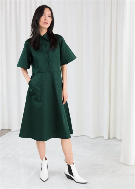 Model Front Image Of Stories Utilitarian Midi Dress In Green Midi