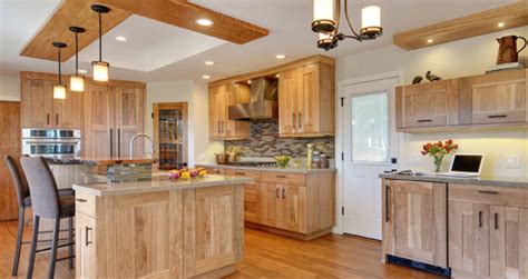 You'll need some basic power tools, a few supplies and, unless you want to do a drastic stain color change, you don't even have to strip the old finish from the doors. Light Stained Cabinets | online information