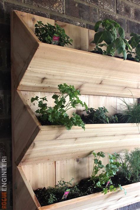 This diy planter box tutorial is the best of both worlds… it had a modern feel, it's decorative, it looks nice and pricey, and it's under $30 dollars. Cedar Wall Planter { Free DIY Plans } Rogue Engineer