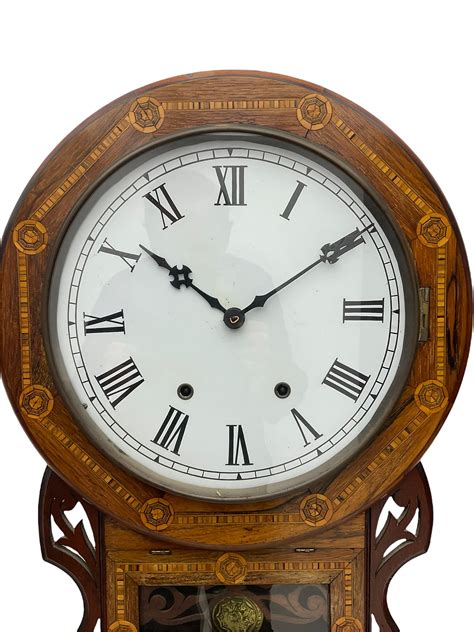 An American Late 19th Century Oak And Mahogany Drop Dial Wall Clock By Chauncey Jerome And Sons
