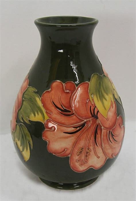 6 1/2 h x 4 1/2 d. A Moorcroft green floral vase. 21 cm high - Moorcroft ...