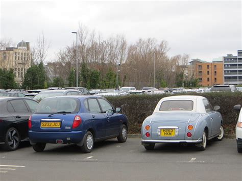 1998 Daihatsu Sirion 1 0 And 1991 Nissan Figaro As Parked Flickr