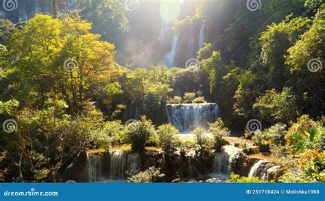 Beautiful Waterfall In Green Tropical Forest Mountain Jungle With