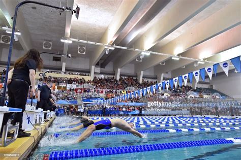 Swimmers Compete In The Mens 200 Yard Backstroke During The Ncaa