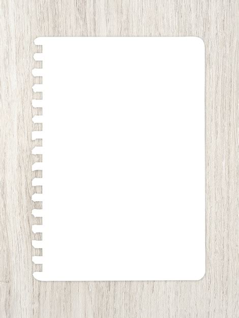 Premium Photo White Paper Sheet On Wood For Ackground