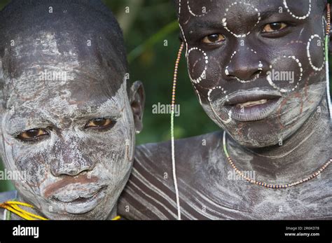 Surma Man And Surma Boy With Body Painting Face Painting Kibish Omo Valley Ethiopia Africa