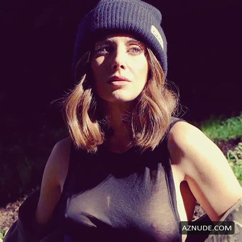 Alison Brie Shows Her Boobs While Posing In A See Through Black T