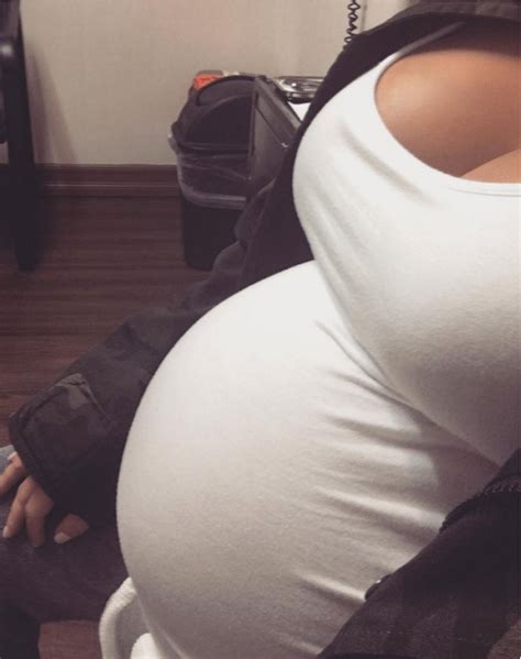 Kim Kardashian Shares Huge Bump Photo As She Reveals Painful Process