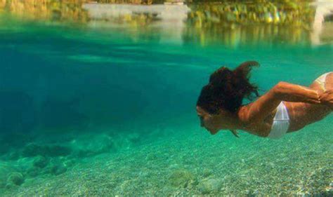Bikini Babes Thumb Position In Underwater Photo Shocks