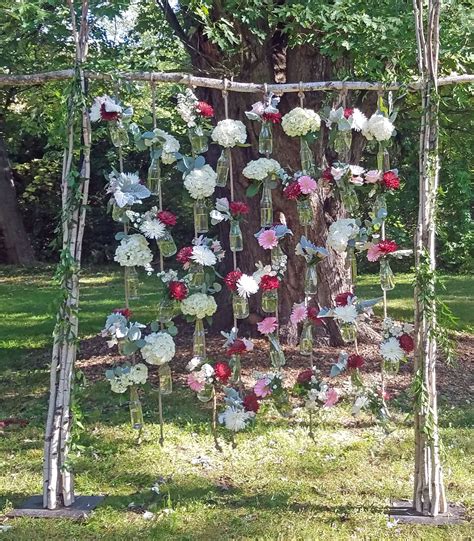 A Rustic Wedding Backdrop For An Outdoor Ceremony Rustic Wedding Backdrops Wedding Backdrop