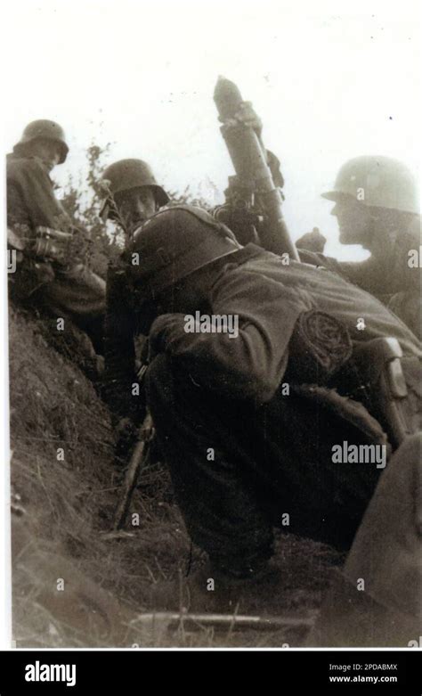 World War Two Bandw Photo German Army Mortar Crew Prepare To Fire Their