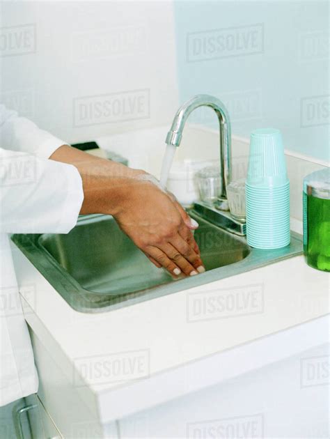 Woman Washing Hands Stock Photo Dissolve