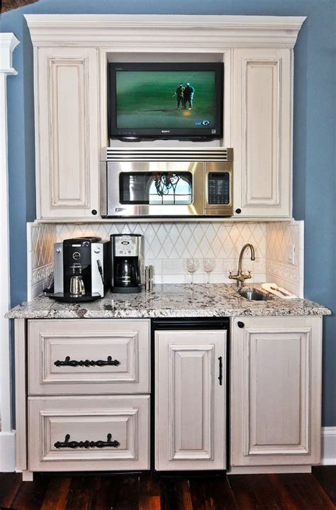 Today we explore the wacky world of the compact kitchen. Love the location of the microwave, beverage fridge and ...