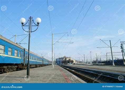 Railway Platform With Lamppost And Passenger Carriages Editorial