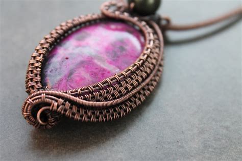 Maybe you would like to learn more about one of these? PDF Tutorial, wire weave pendant using a Sugilite focal ...