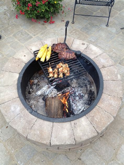 An Efficient Fire Pit With A Cooking Grill In Your Backyard Your