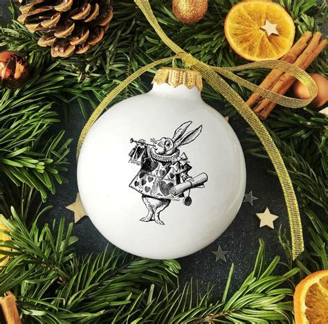 Alice In Wonderland Christmas Bauble With Rabbit By Kina Ceramics