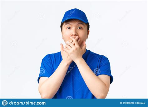 Shocked Astounded Asian Man Witness Accident Gasping And Cover Mouth Gossiping With Coworkers
