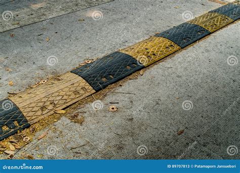 Yellow And Black Speed Bump Stock Image Image Of Control Bump 89707813