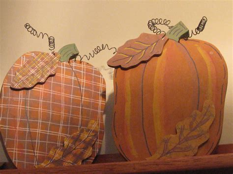 Painted wood pumpkins for fall | Wood pumpkins, Painted wood pumpkins, Painting on wood