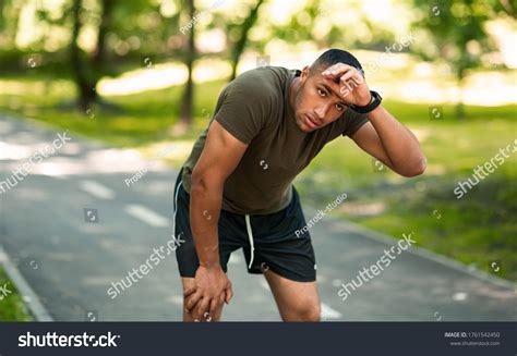 Athletic Black Guy Feeling Tired After Stock Photo 1761542450