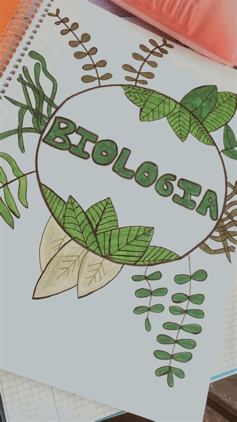 A Notebook With The Word Broloosa Written On It And Leaves Surrounding
