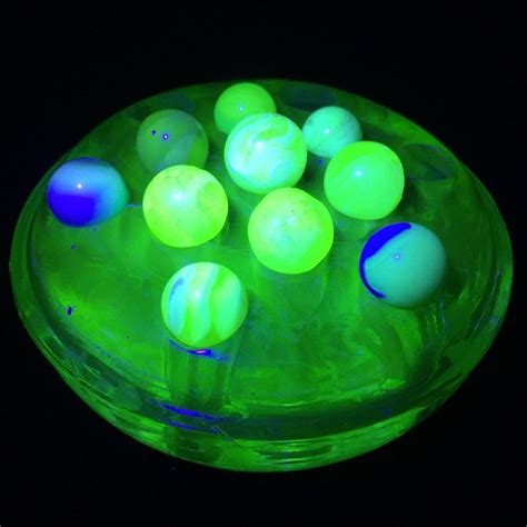 Lot Of 10 Uranium Marbles And Glass Base That Glow Under Uv Black Light