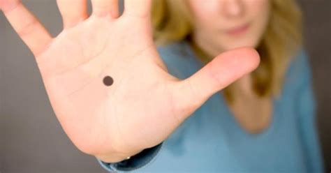 spot a black dot on someone s palm don t ignore it hurry and call the police