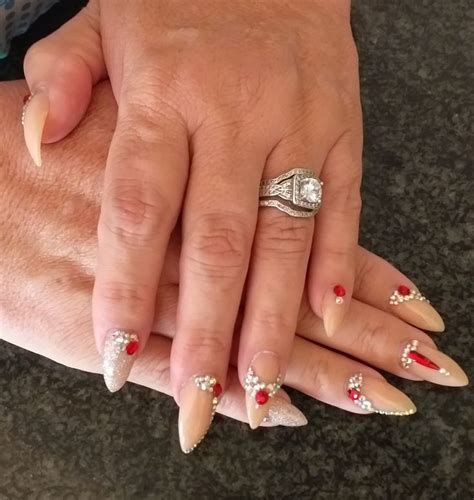 Nude Bling With A Touch Of Red Nagels