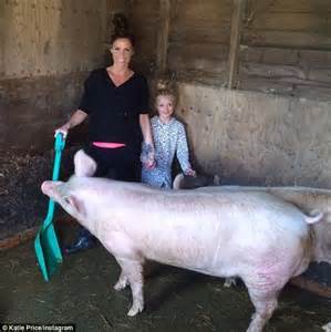 Katie Price Puckers Up To Pet Porker As She Takes A Dig At Pig Exes