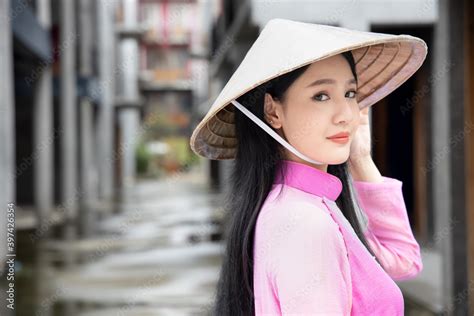 Happy Smiling Vietnamese Girl Portrait Of Exotic Asian Vietnam Woman In Traditional Vietnamese