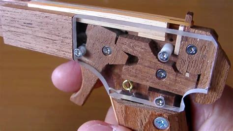 This is a tutorial on how to make a rubber band gun with just a piece of foam board and a couple of other things. Rubber band gun - YouTube