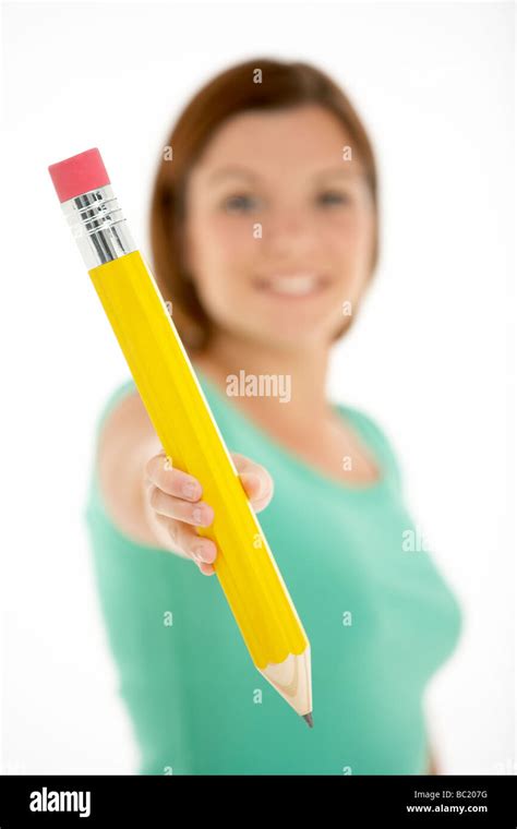 Woman Holding Big Pencil Stock Photo Alamy
