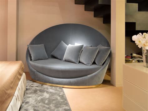 Style Roundup - Decorating With Round Sofas And Couches ... Not just supportive, sofas with high backs are stylish, too.