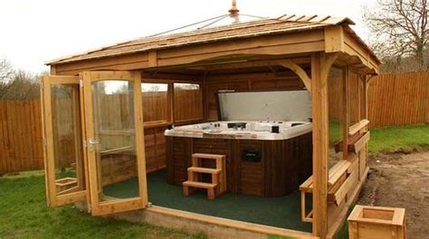 A Wooden Gazebo With An Outdoor Hot Tub