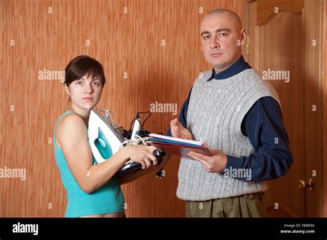 Collector Is Trying To Get The Debts From Woman Stock Photo Alamy