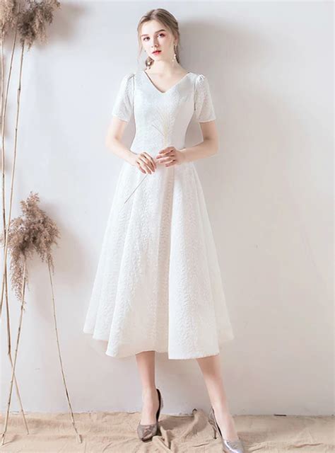 27 incredible tea length wedding dresses | wedding dresses guide. Silhouette:a-line Hemline:tea length Neckline:v-neck ...