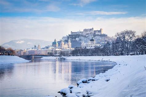 Salzburg Skyline With Festung Hohensalzburg And River Salzach In Winter