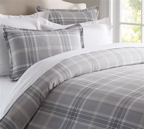 See matches in oversized comforter features various seashells and starfish in dark blue, steel blue, and slate gray watercolor that pop from the ivory cotton. Arthur Grey Plaid Patterned Duvet Cover & Sham | Pottery Barn