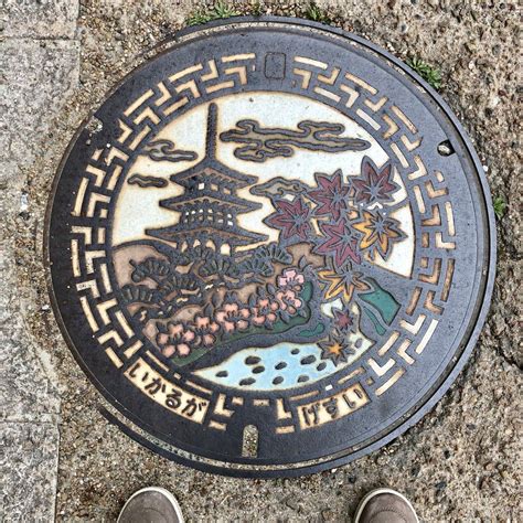 Japanese Manhole Covers Are Adorned With Unique Local Designs Cover