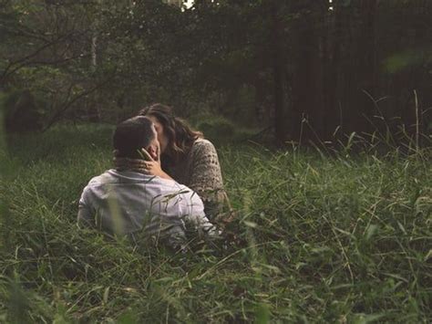 Man And Woman Kissing On Green Grass Field Lost In The Woods Romances Pictures Grass Field
