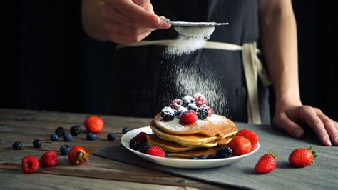 Sugar Powder Being Poured Over Pancakes Stock Footage Sbv 337835565