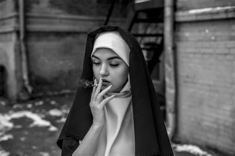 Premium Photo Nun Smoking Portrait Of A Smoking Young Nun