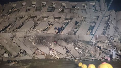Building Collapses In 64 Quake In Taiwan 160 Pulled Alive Many
