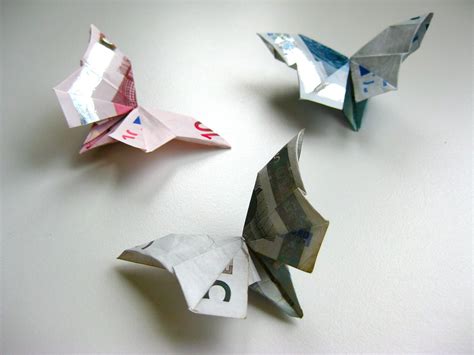 10, 5 und 20) erhält man einen bunten schwarm schmetterlinge. Origami Geldschein Schmetterling Video-Anleitung ...