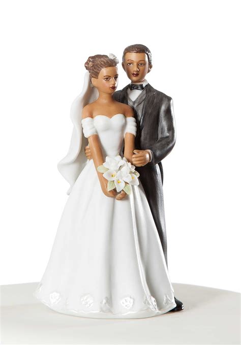 Turn your delicious cake into the focal point of your special day by accenting it with one of these custom geeky wedding cake toppers. Elegant African American Wedding Couple
