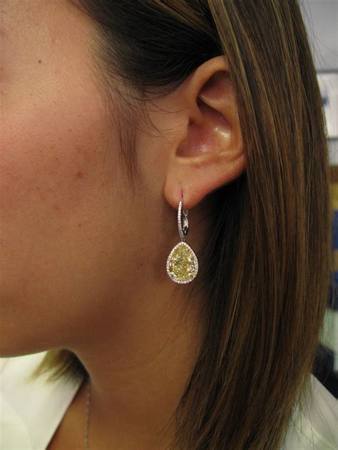 Real diamond solitaire stud earrings 1.08 carat d vs1 round cut 14k. 12.75 Carat GIA Cert Fancy Yellow Pear Diamond Leverback ...