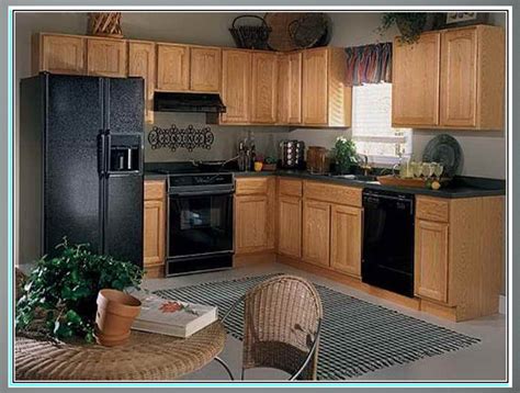 Start with new kitchen cabinets from the home depot. Kitchen Paint Colors With Oak Cabinets And Black ...